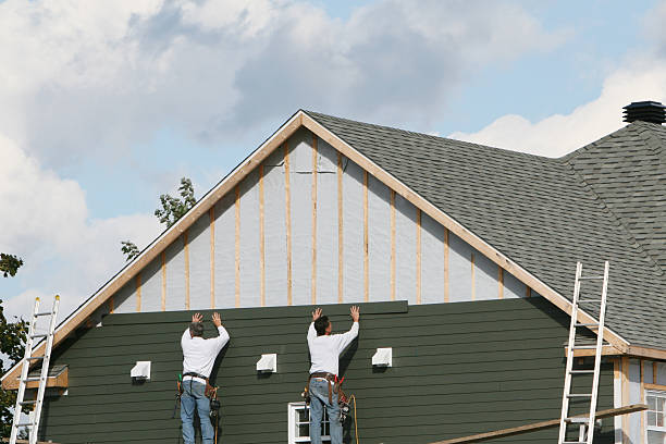 Professional Emergency Siding Repair technician working in Dysart, PA